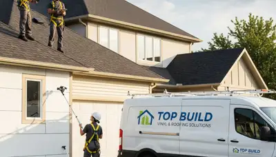 Roof inspection specialist checking residential shingles in Milwaukee, WI